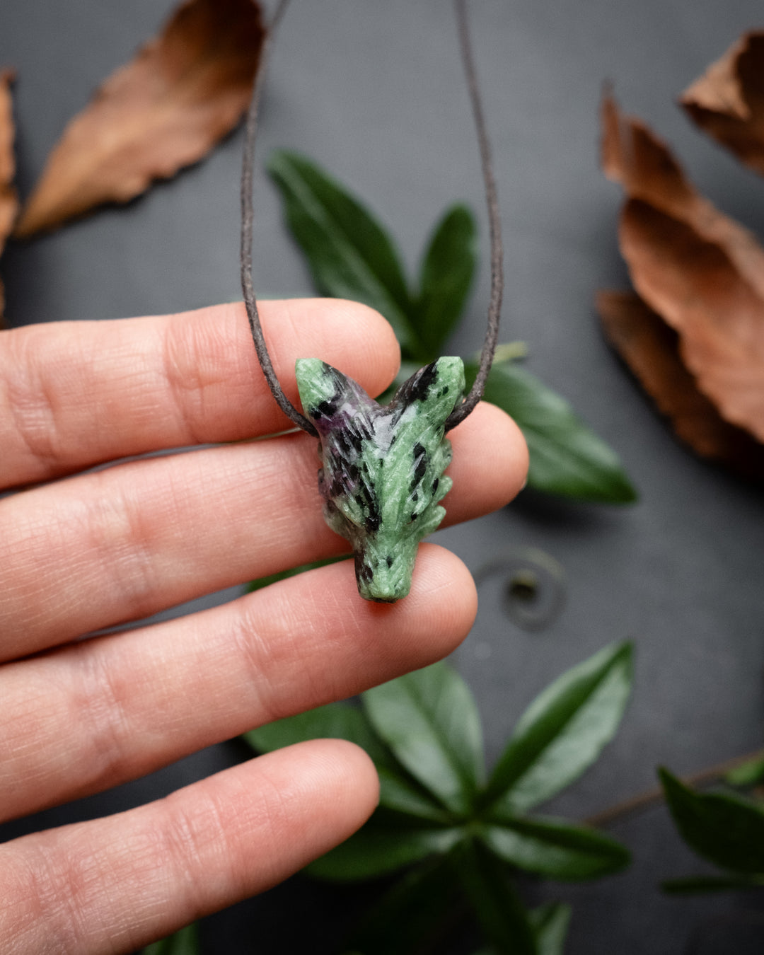 Small Ruby in Zoisite Hand Carved Wolf Necklace