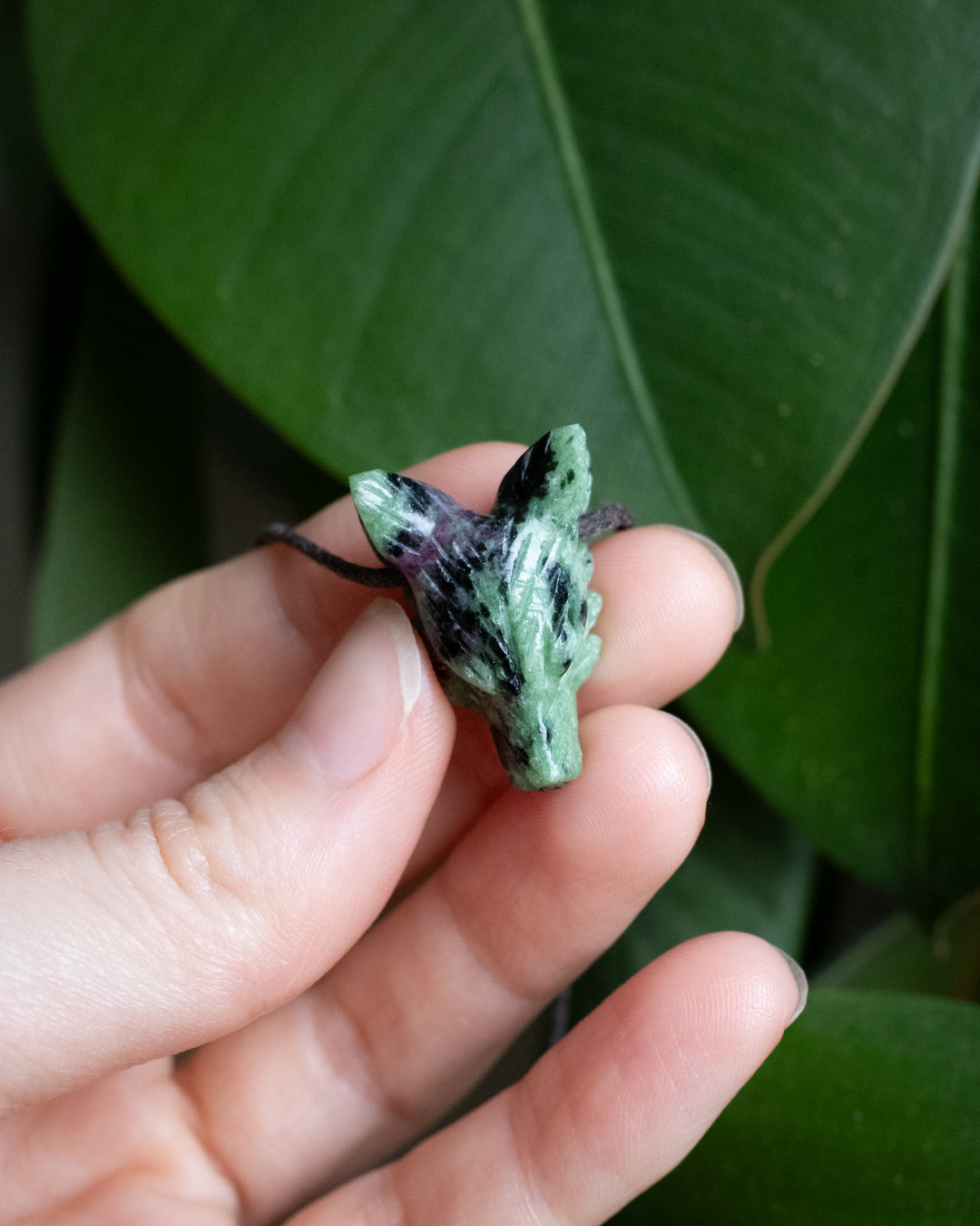 Small Ruby in Zoisite Hand Carved Wolf Necklace